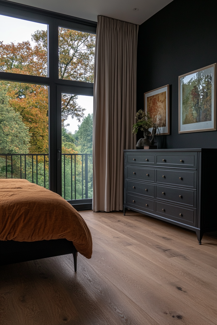 Black bedroom with industrial elements like exposed brick and metal bed frame