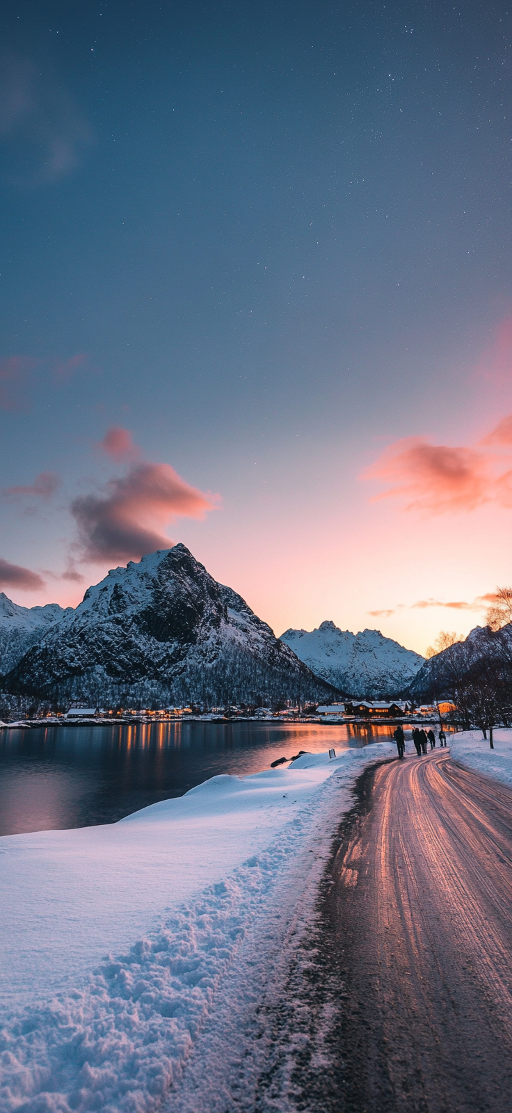Northern Lights illuminating snow-covered mountains