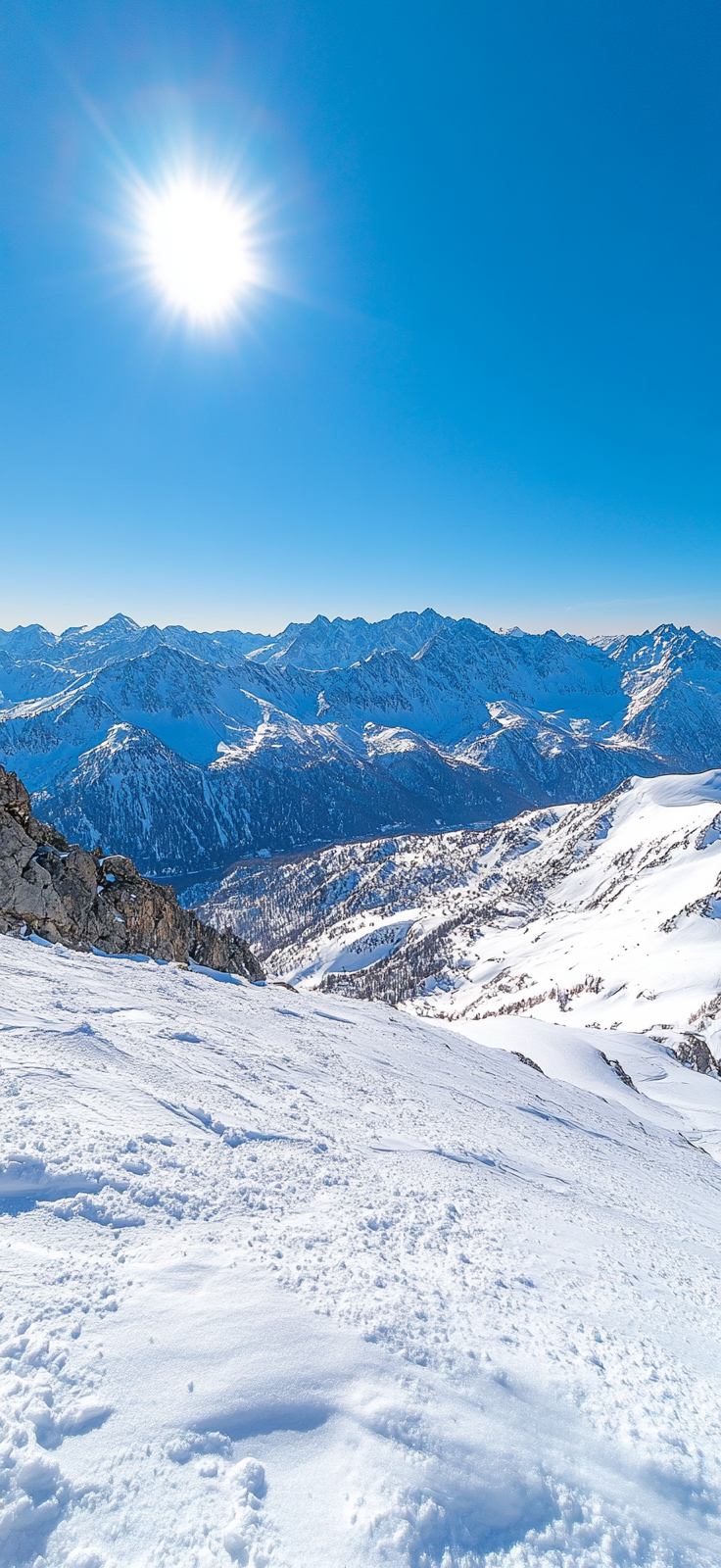 snowy mountain peaks under clear blue sky