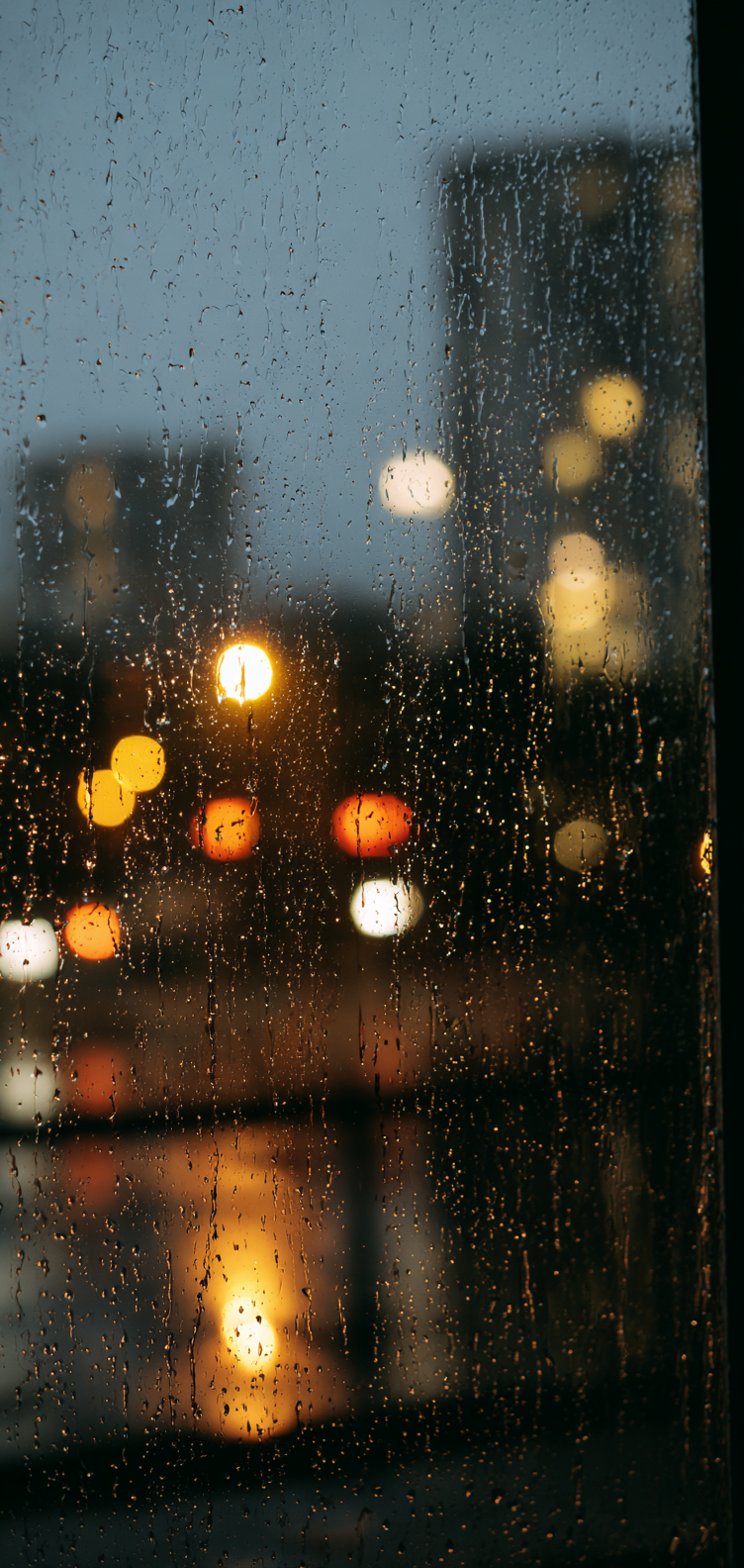 Moody rainy window macro, vertical